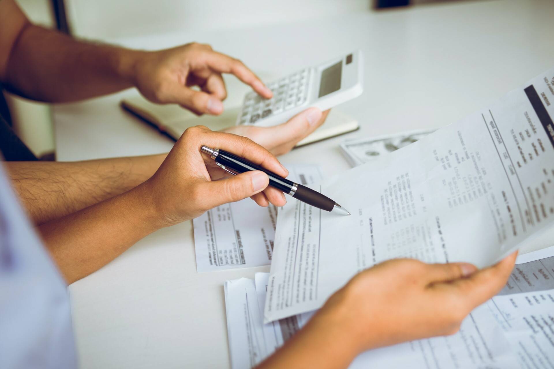 couples and men and women are together analyzing expenses or finances in deposit accounts